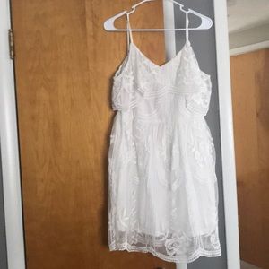 Lace white dress. About knee length.